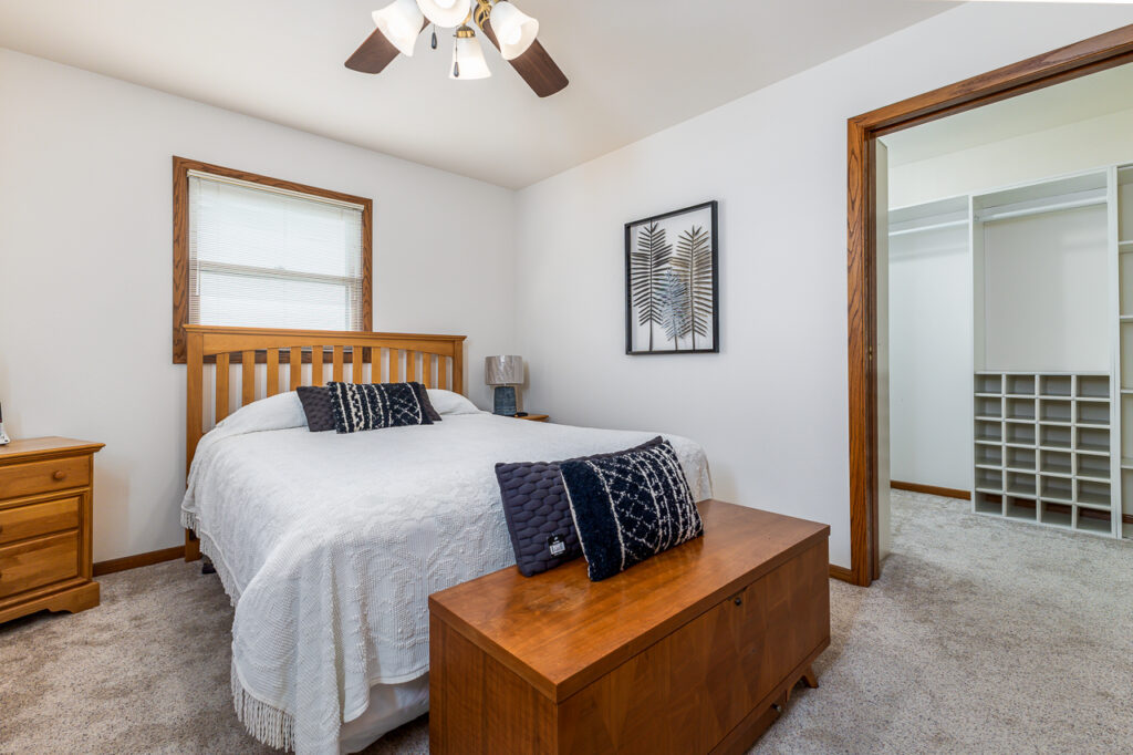 Primary bedroom of home for sale in Darlington, WI